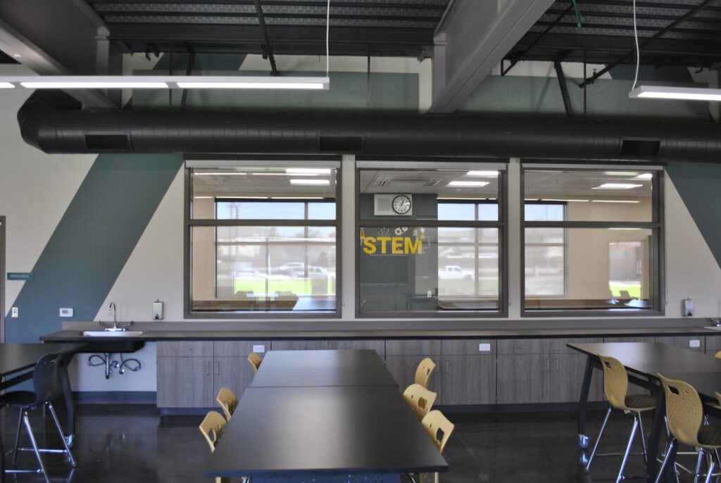 STEM lab at Greenfield High School featuring workstations, large windows, and a focus on educational technology.
