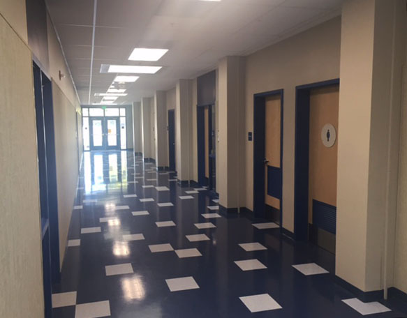 Hallway inside Alhambra High School's new modular school building with access to versatile classrooms.