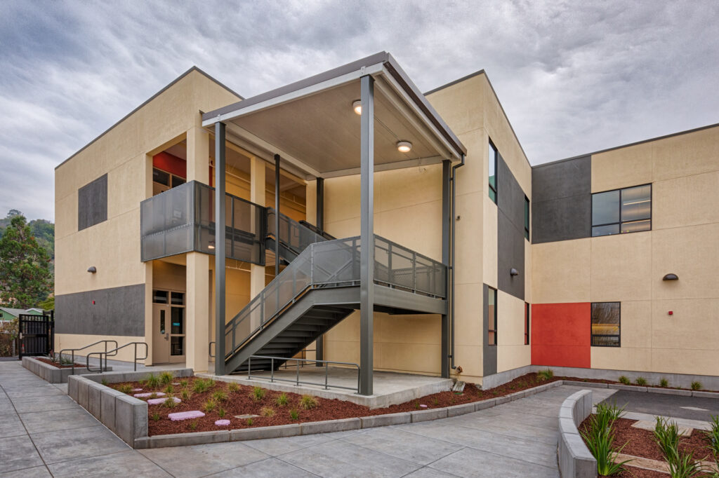 Staircase leading to the second floor of Davidson Middle School’s modular science building, featuring a sleek, modern design.
