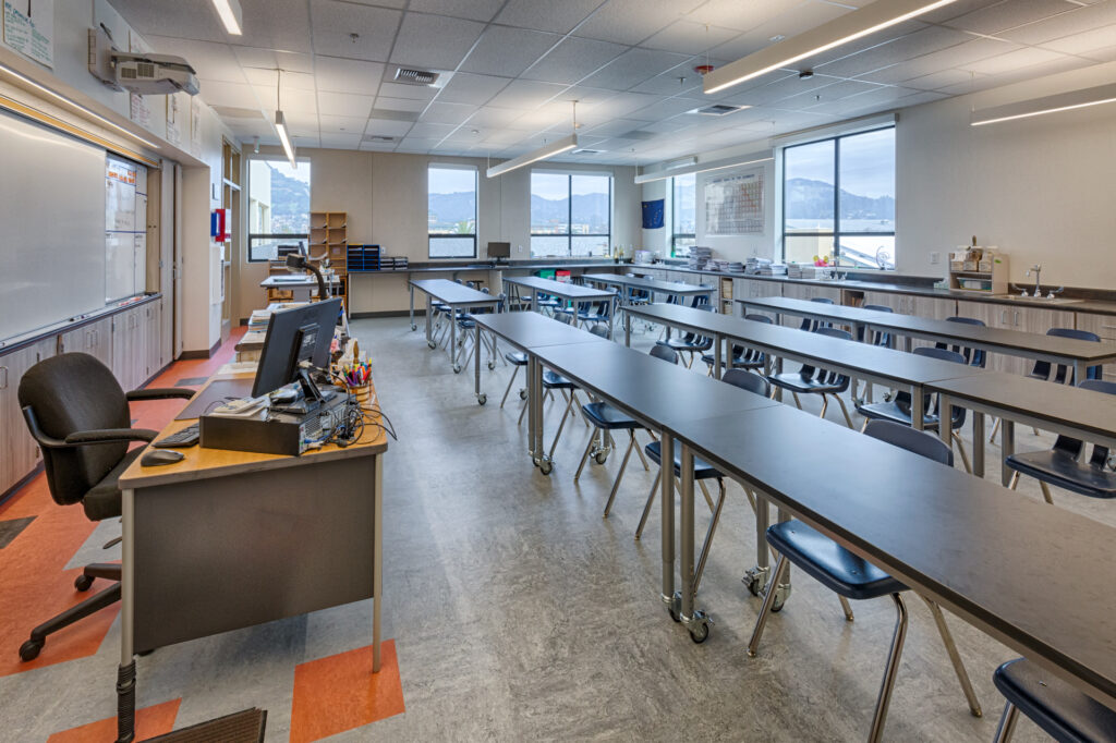 Teacher’s desk and classroom layout in a science room at Davidson Middle School, with modern lab tables and large windows.