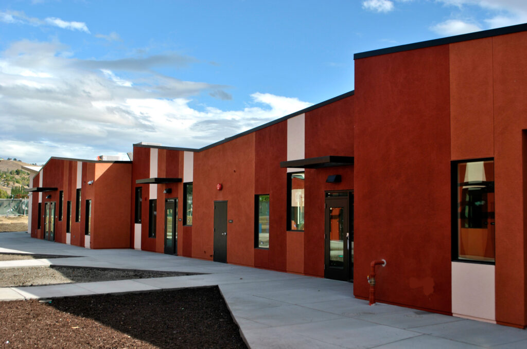 Back entrance of the Milpitas Joint Use Education Center, showcasing the modern layout and design.