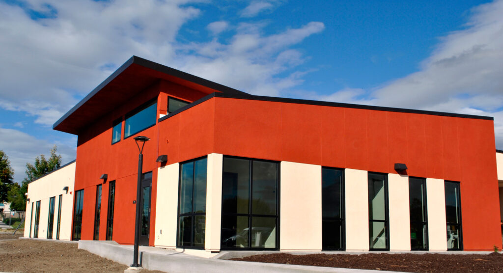 Exterior front view of the Milpitas Joint Use Education Center, a modern facility for high school and college students.