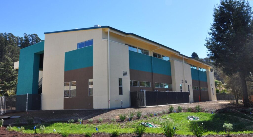 Side view of the two-story classroom building at Main Street Elementary School, designed to accommodate growing student enrollment.