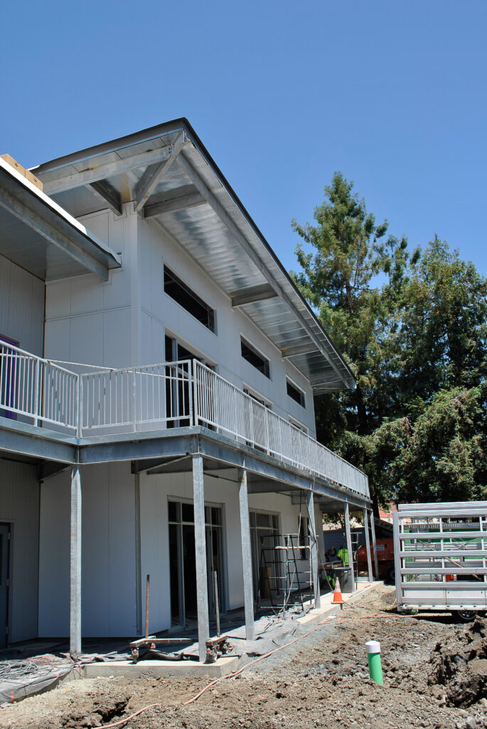 Two-story classroom building at Rocketship Education Senter Road campus, constructed with a structural steel frame.