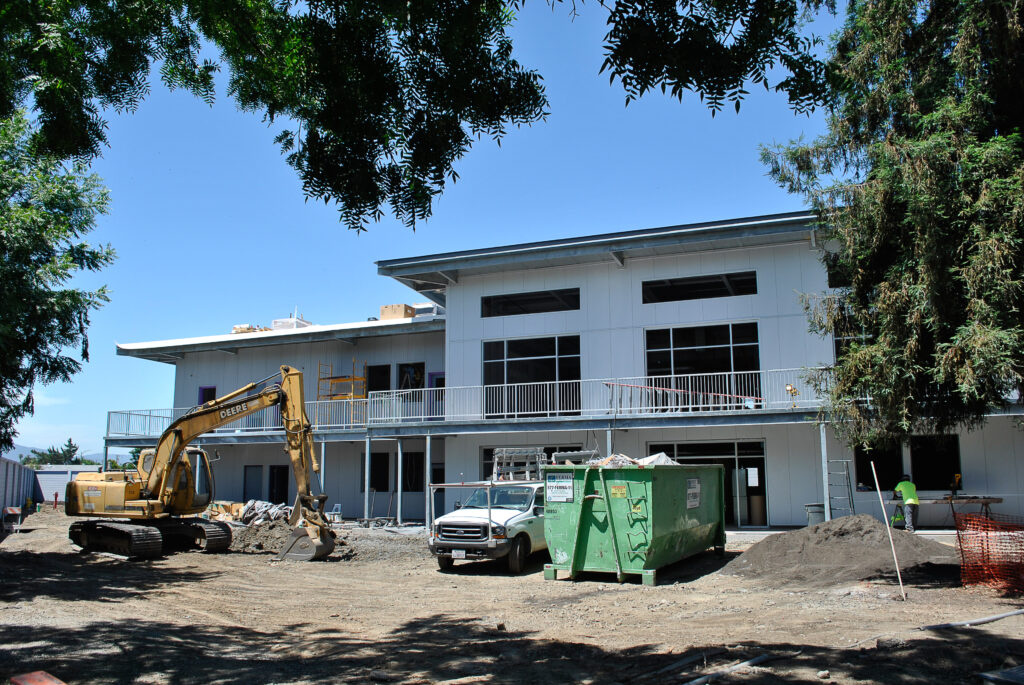 Ongoing construction at Rocketship Education Senter Road, showing the two-story modular classroom building and equipment.