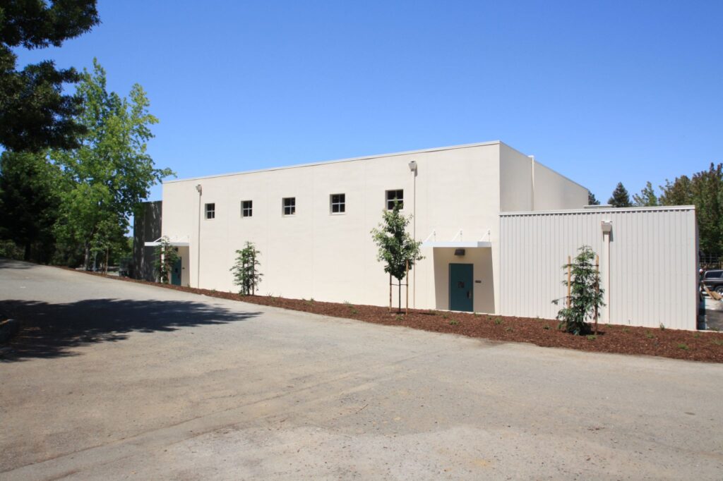 Exterior view of the new multi-use building at Grace Patterson Elementary, highlighting the facility's design and structure.