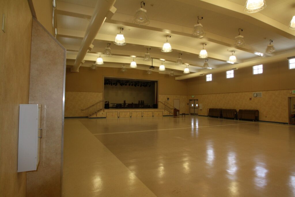 Wide view of the multi-use building at Grace Patterson Elementary, showcasing the large open space designed for various school activities.