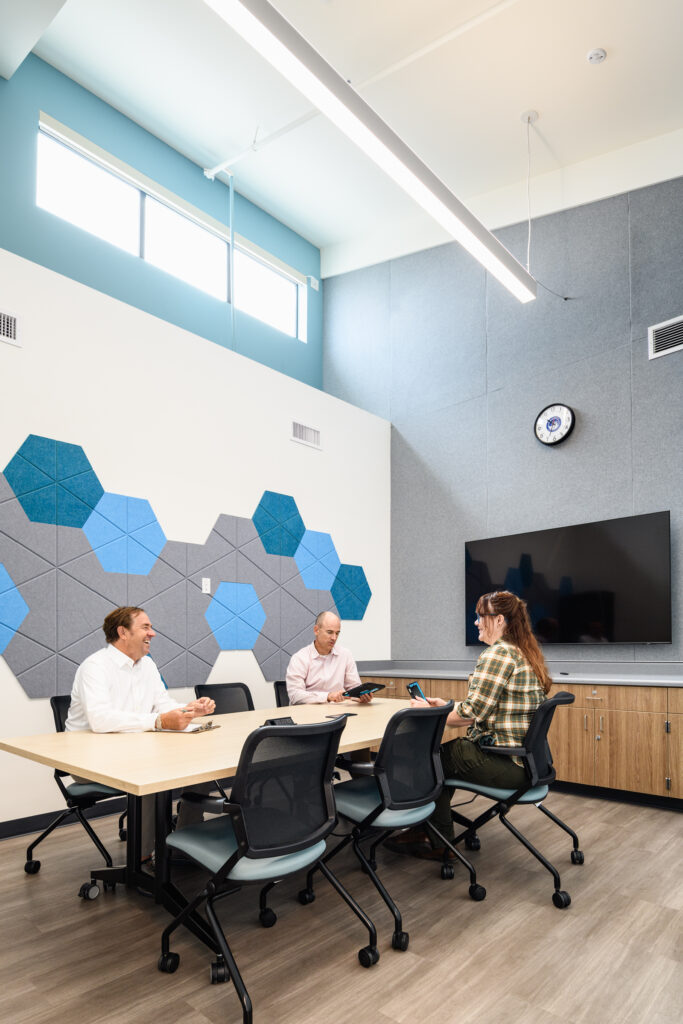 The district office showcases a sleek, modular design with accessible outdoor corridors and modern architectural lines.