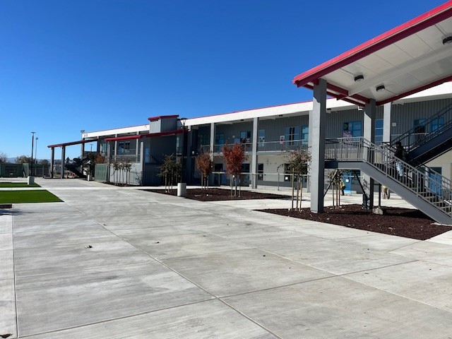 Exterior view of the completed North Salinas High School construction project, featuring the new two-story classroom and administration building.